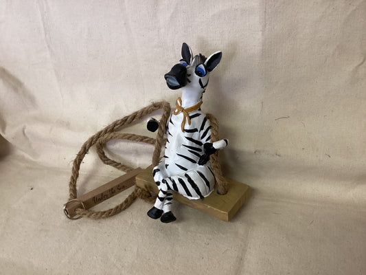 Zebra on Swing