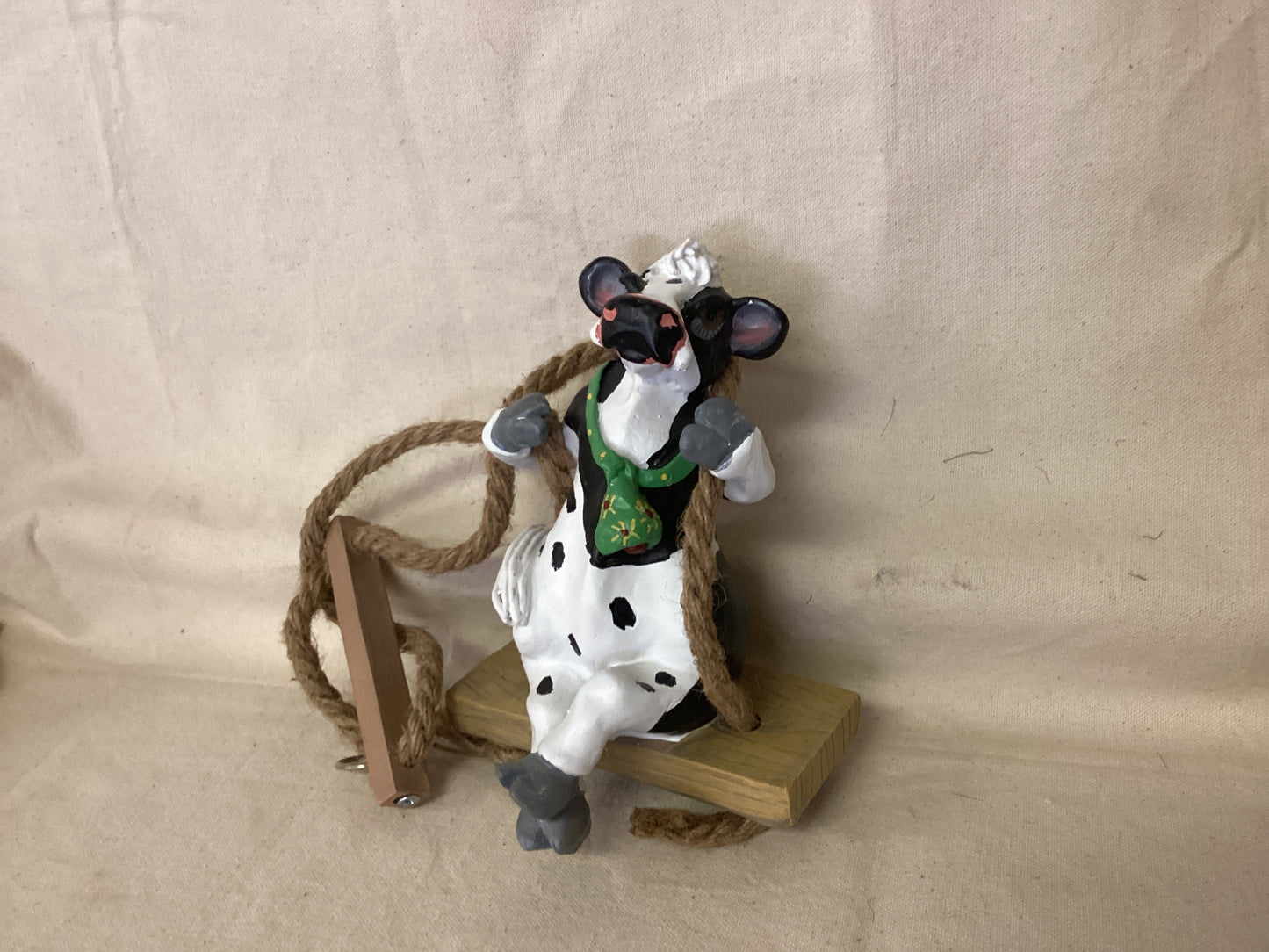 Cow on Swing