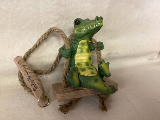 Alligator on Swing