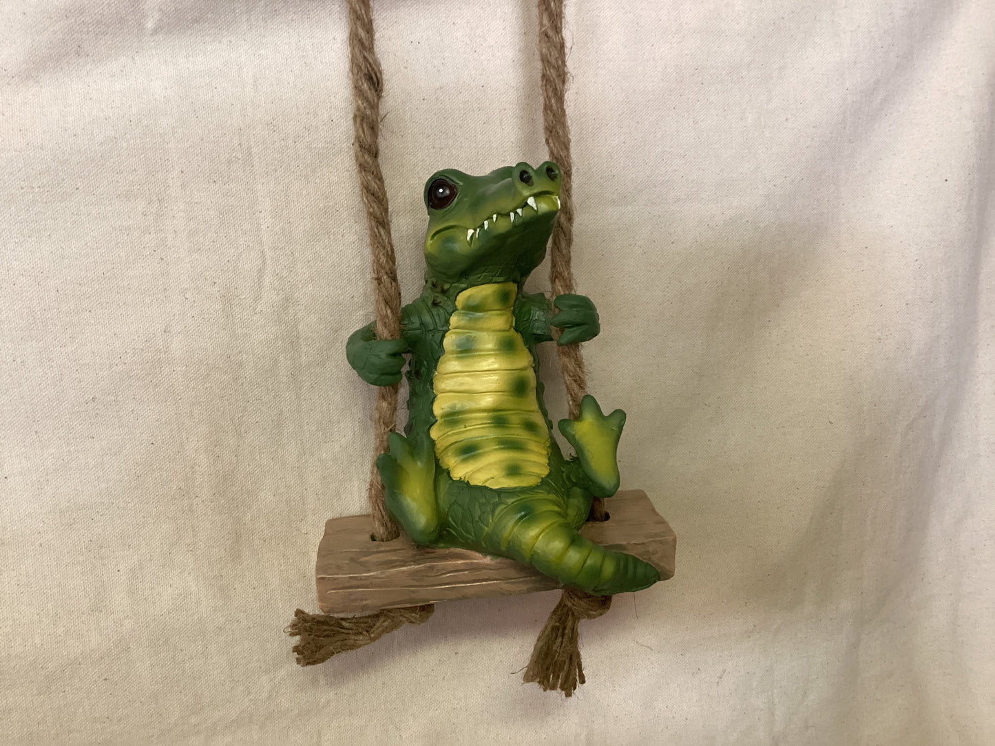 Alligator on Swing